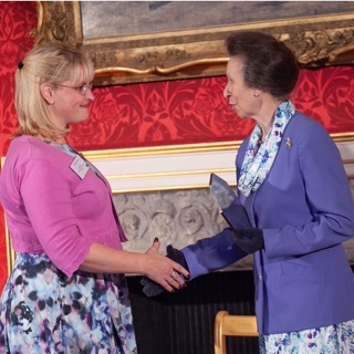Anna Hiett being presented with the Princess Royal Training Award by Princess Anne.